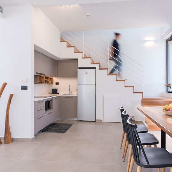 Spacious two bedroom grand villa with modern kitchen and dining area at Avdou Collection Crete
