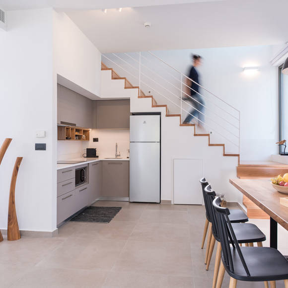 Spacious two bedroom grand villa with modern kitchen and dining area at Avdou Collection Crete